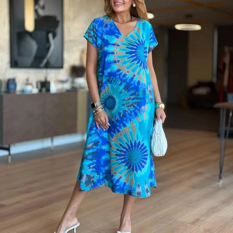 Vestido SunDance™ em Viscose Premium com Estampa Artística e Caimento Solto / Movimento, Cor e Feminilidade Sem Esforço!