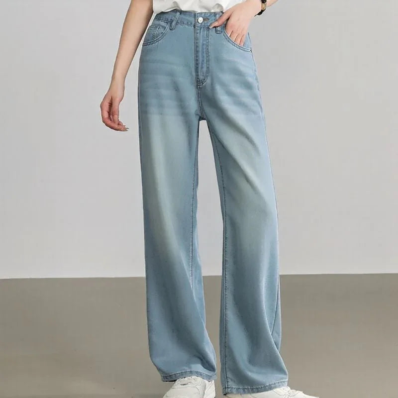 Calça Jeans Meghan™ com Modelagem Relax Premium / A Mais Soltinha, Leve e Versátil que Você Vai Vestir!