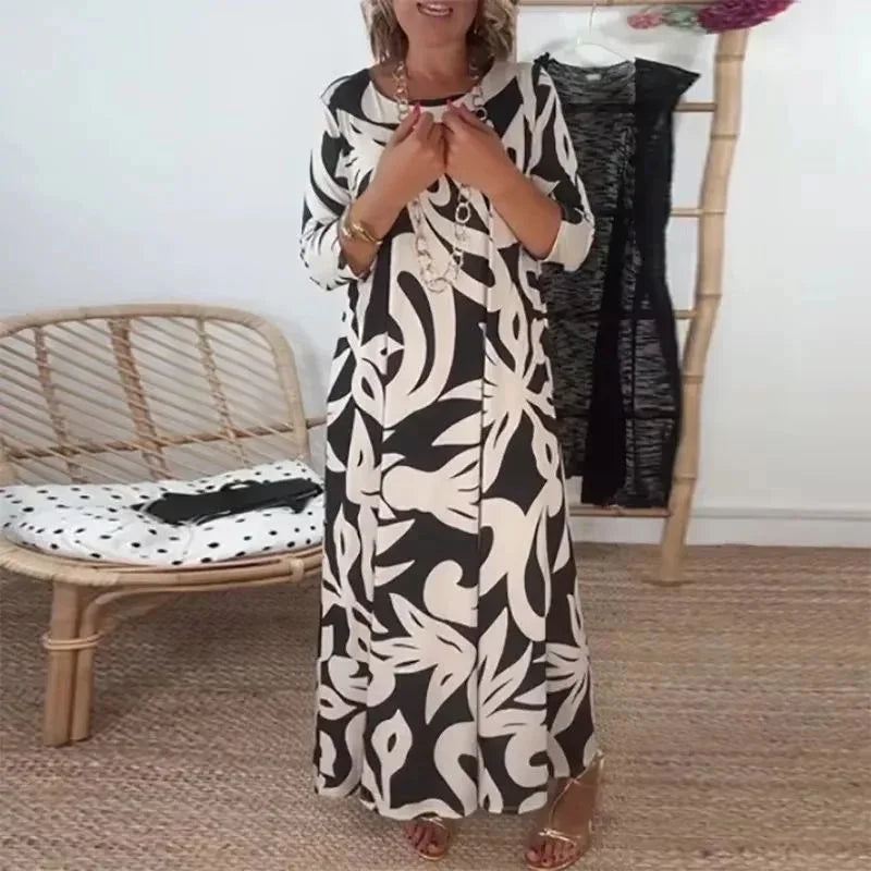 Vestido Mídi Longo Nerina™ com Estampa Floral Abstrata / A Elegância Solta que Inspira Liberdade!