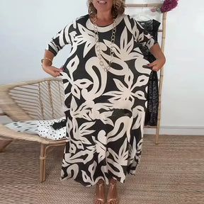 Vestido Mídi Longo Nerina™ com Estampa Floral Abstrata / A Elegância Solta que Inspira Liberdade!