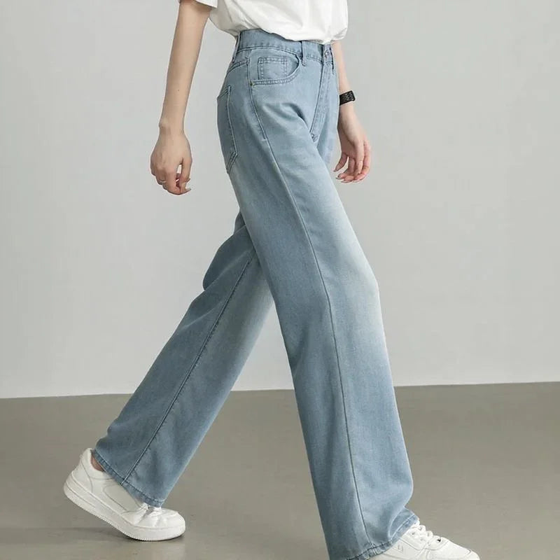 Calça Jeans Meghan™ com Modelagem Relax Premium / A Mais Soltinha, Leve e Versátil que Você Vai Vestir!