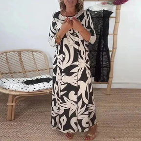Vestido Mídi Longo Nerina™ com Estampa Floral Abstrata / A Elegância Solta que Inspira Liberdade!