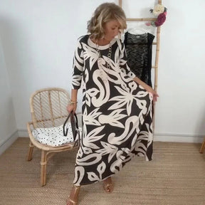 Vestido Mídi Longo Nerina™ com Estampa Floral Abstrata / A Elegância Solta que Inspira Liberdade!